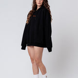Firma Negroni | Sudadera con capucha bordada de algodón orgánico para mujer